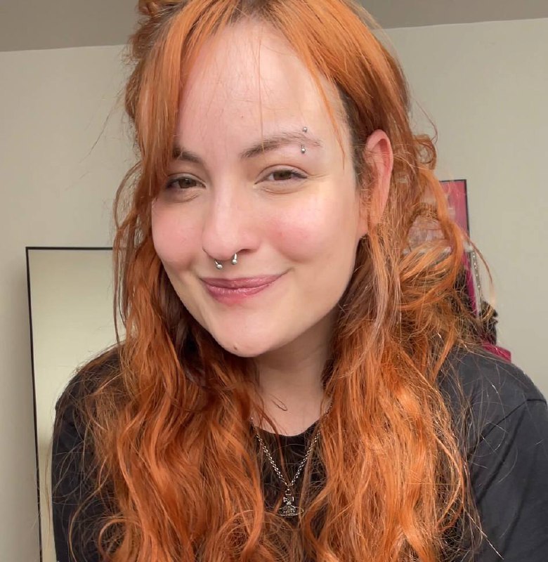 A picture of a girl with orange hair